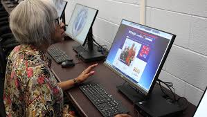 friendship center senior using computer