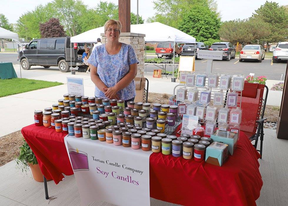 Woman selling candles